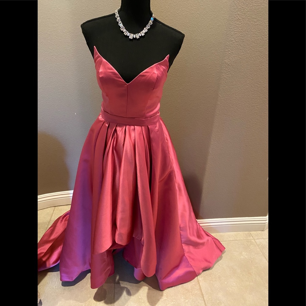 Custom-made high-low strapless gown.